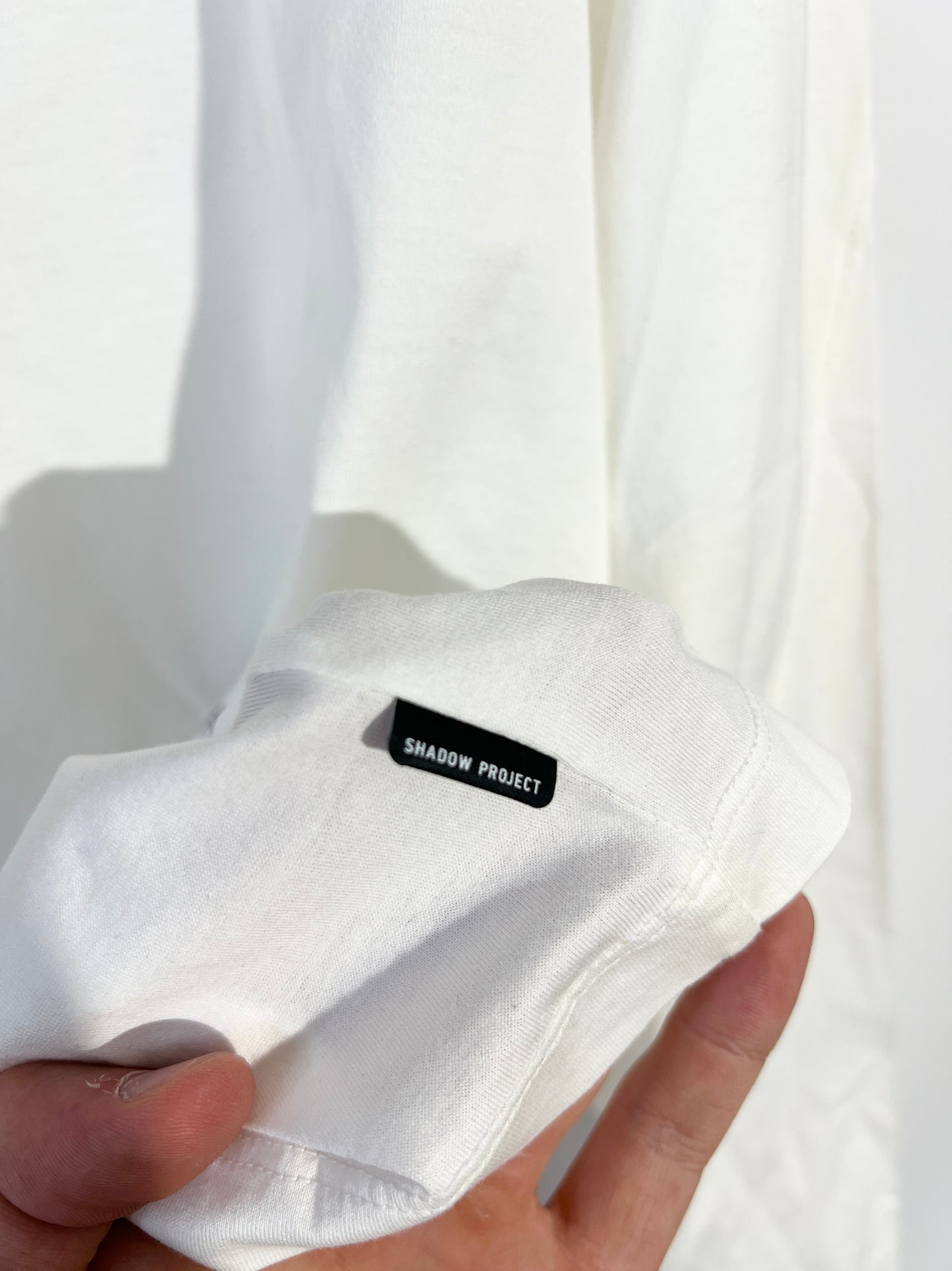T-shirt a maniche lunghe bianca Stone Island Shadow Project (nuova con cartellino) - Taglia M