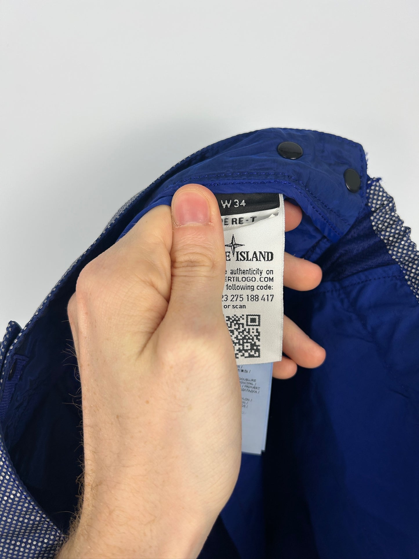 Pantaloni pixel reflective blu Stone Island - Taglia W34