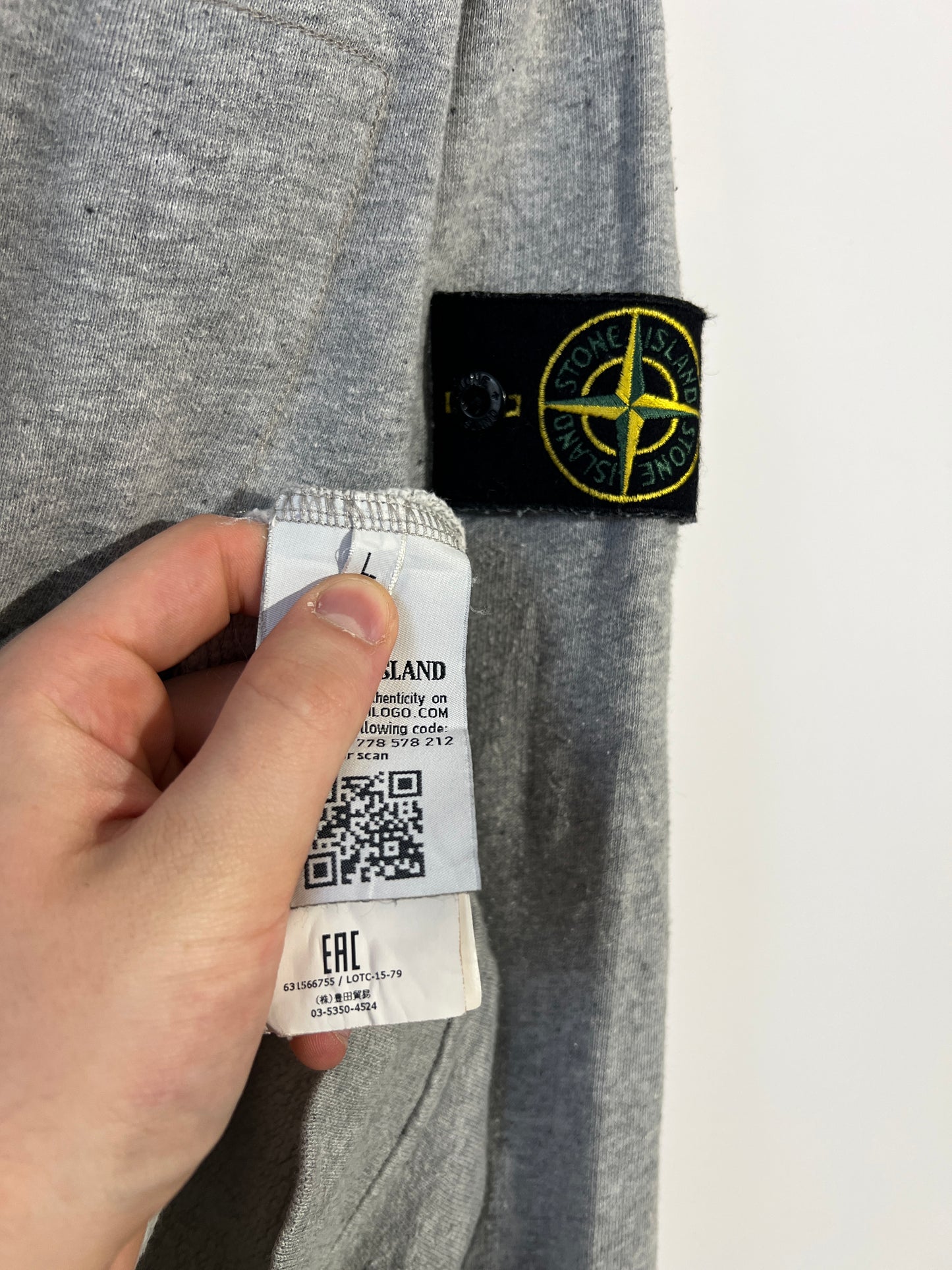 Maglione grigio con taschino sul petto Stone Island - Taglia L