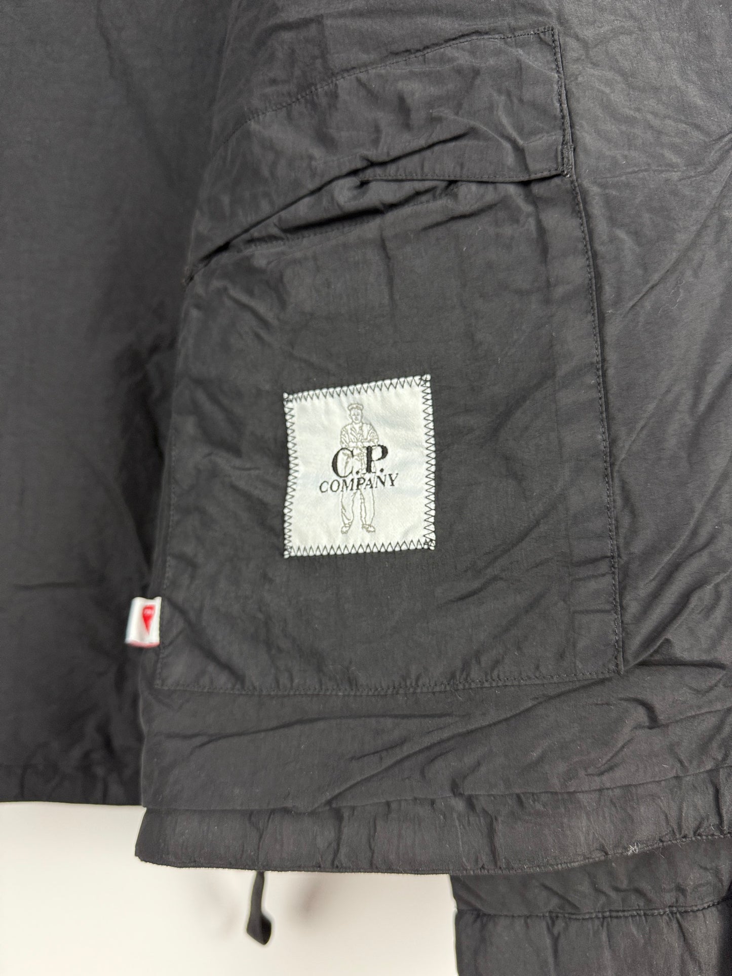 Giacca Flatt Nylon nera in Primaloft C.P. Company (nuova con cartellino) - Taglia L