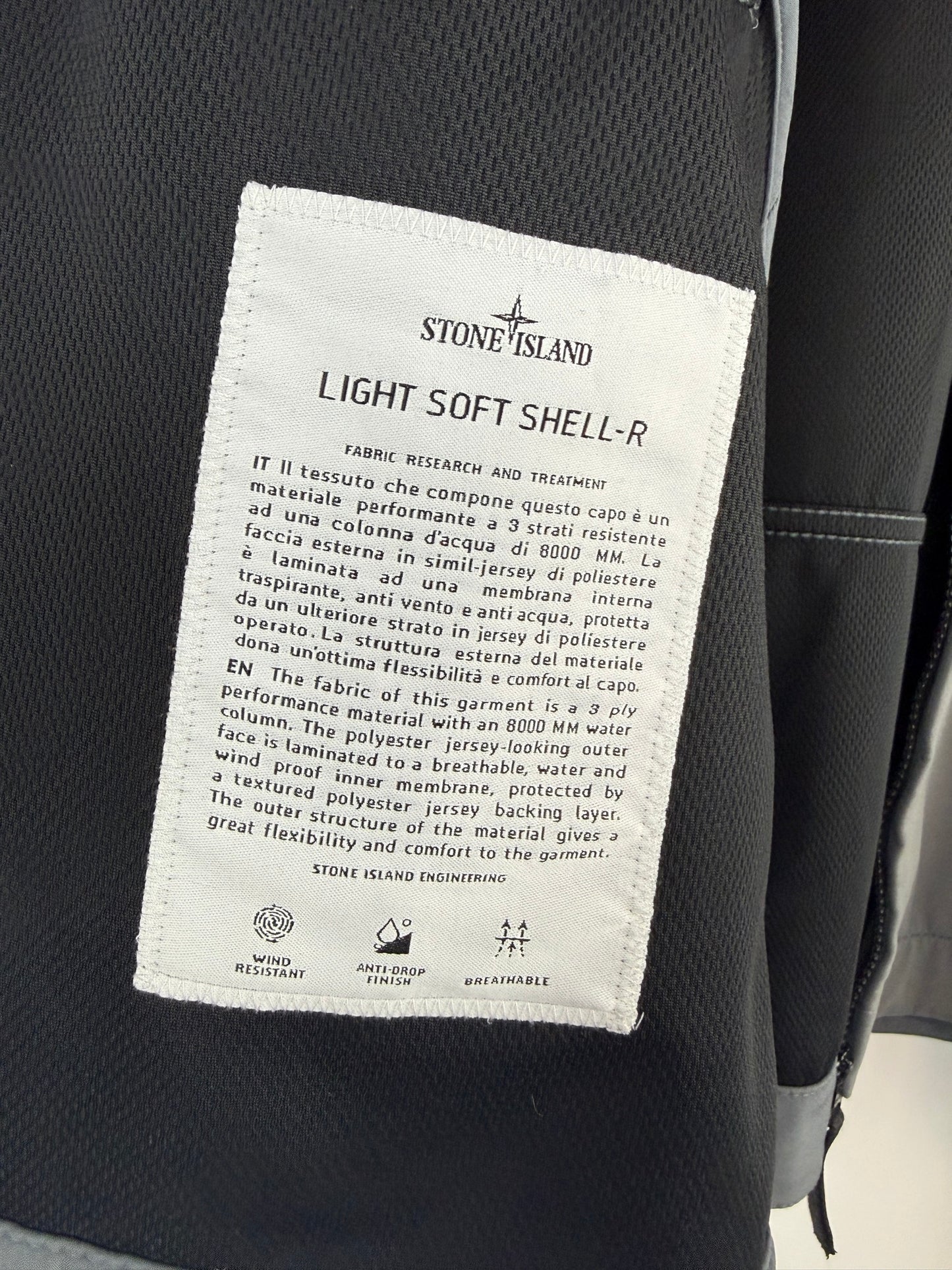 Giacca Light Soft Shell-R grigia con zip e cappuccio Stone Island - Taglia L