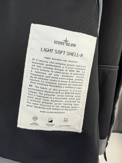 Giacca Light Soft Shell-R grigia con zip e cappuccio Stone Island - Taglia L