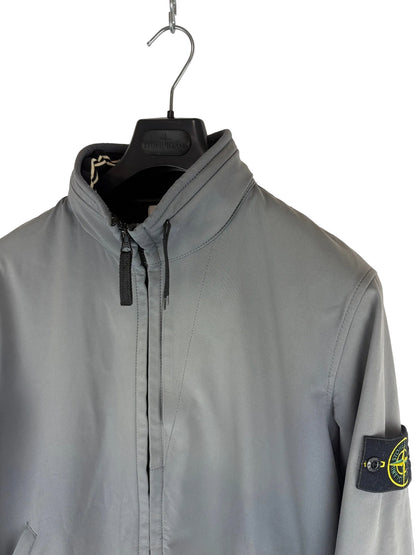 Giacca Light Soft Shell-R grigia con zip e cappuccio Stone Island - Taglia L