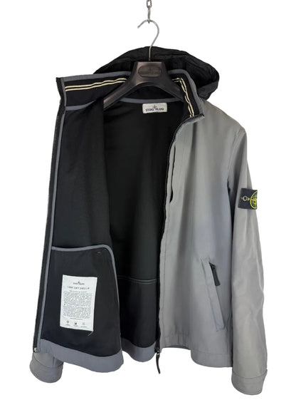 Giacca Light Soft Shell-R grigia con zip e cappuccio Stone Island - Taglia L