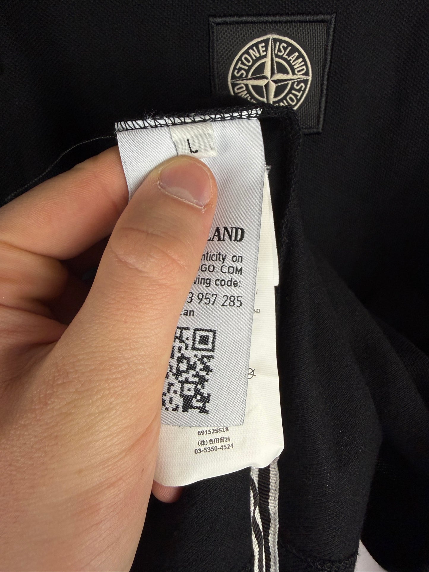 Polo nera a maniche lunghe Stone Island - Taglia L
